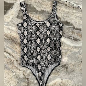 Sexy snakeskin body suit by Timing
